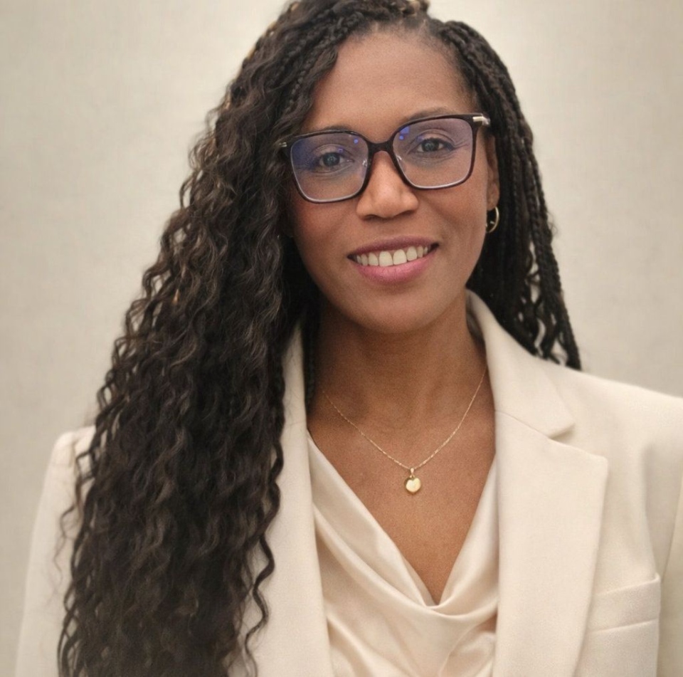Smiling woman with curly hair